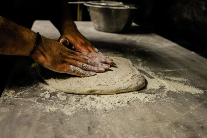 Kneading bread dough by hand in a Fassi family kitchen
